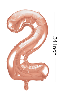 Rose gold number 2 balloon with a measurement label on a white background